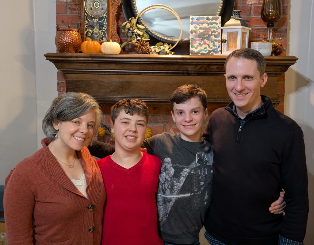 Rachael Chisholm, Marriage and Family Therapist, with her husband David and their two sons.